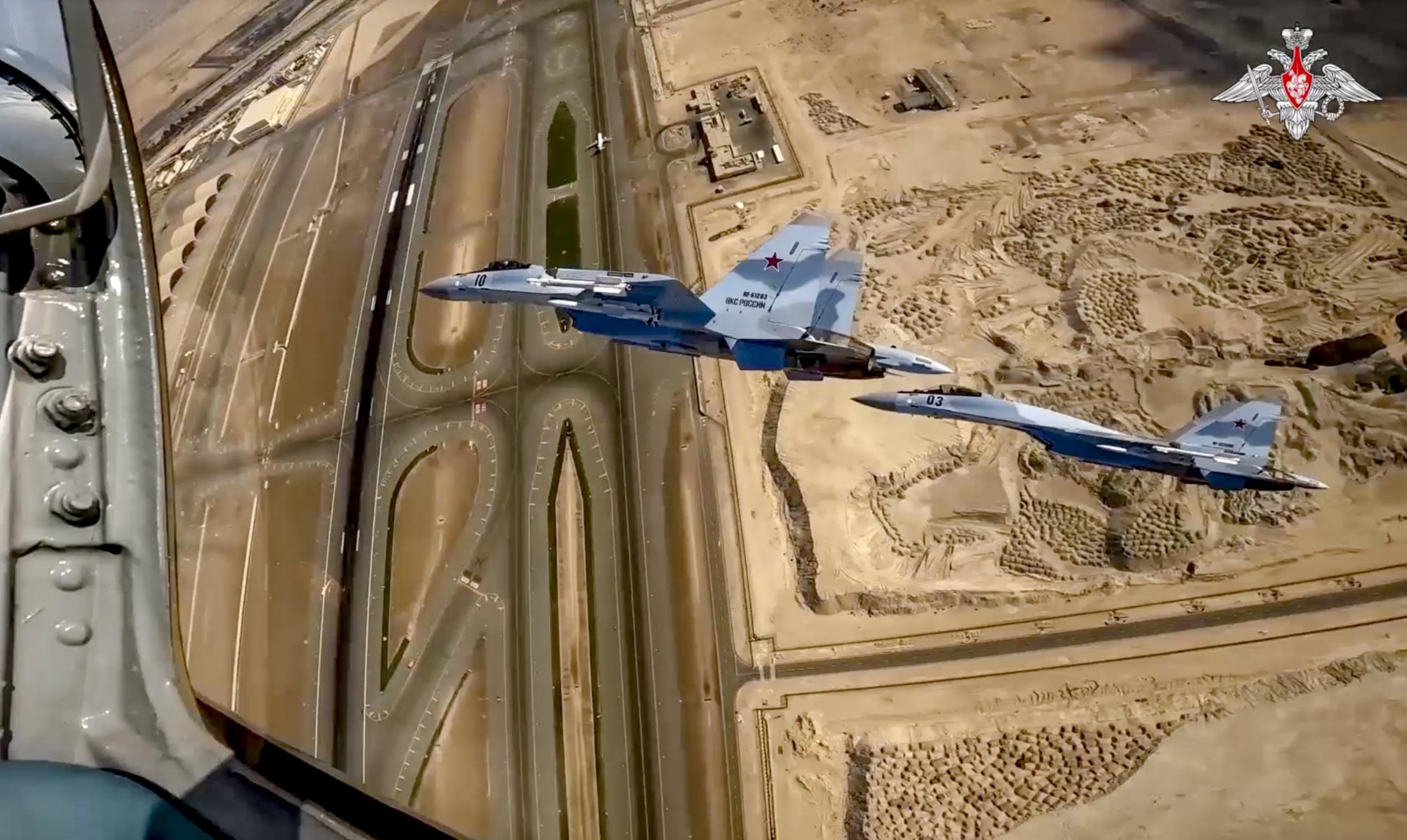 Russian President Vladimir Putin’s plane flanked by Sukhoi-35S fighter jets, over UAE, Dec. 6, 2023. (AA Photo)