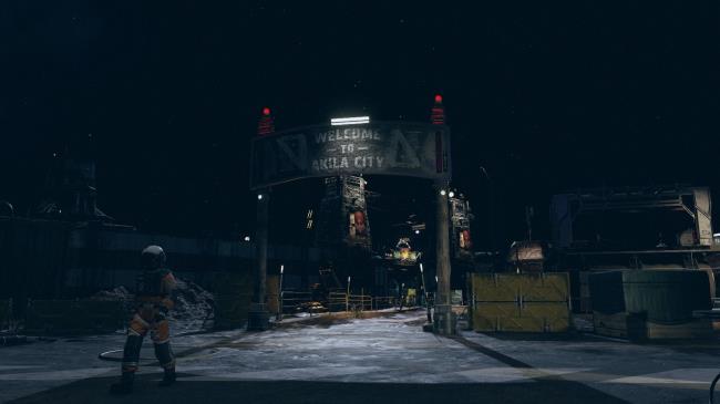 A nighttime scene, and a big board saying 