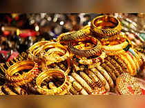 Gold Rate Today: Gold drops Rs 900, silver declines by Rs 5000 in December. What should you do?