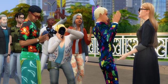 A celebrity Sim from The Sims 4 talking to another Sim as they get photographed by the paparazzi
