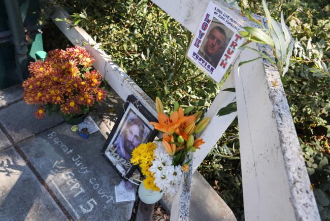 Jennifer Kimberly maintains a memorial to her son, Kirk, at the corner of West Sierra Avenue and Cypress Avenue in Cotati. Photo taken on Tuesday, Aug. 1, 2023. (Christopher Chung / The Press Democrat)