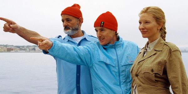 Bill Murray and Owen Wilson pointing while Cate Blanchett stands next to them and smile in the life aquatic with steve zissou