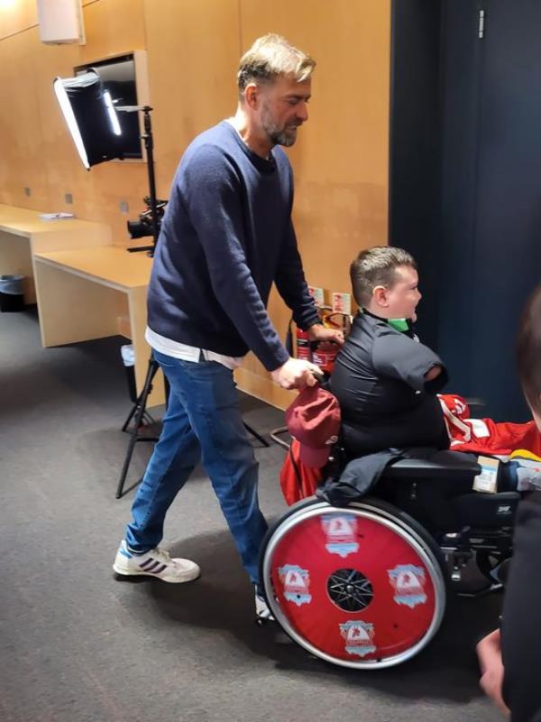 A thrilled Daire getting a tour of the training ground with boss Jurgen Klopp