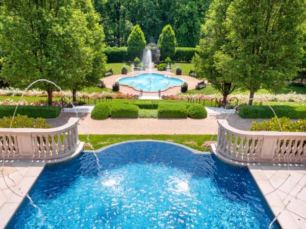The home boasts several pools. 