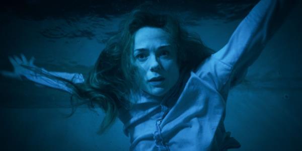 Eve Waller falls into the pool to rescue Elliot in Night Swim